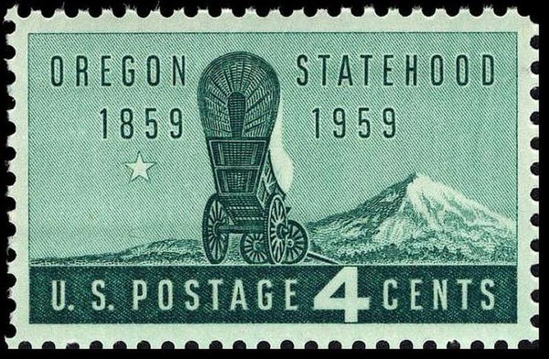 Green 4-cent U.S. postage stamp featuring a covered wagon, mountain, and the text "OREGON STATEHOOD 1859 1959."